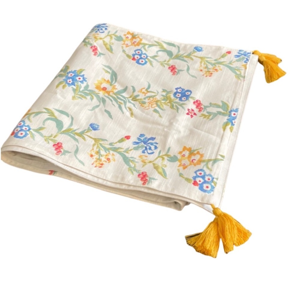 White floral table runner. With yellow tassels. Excellent condition!